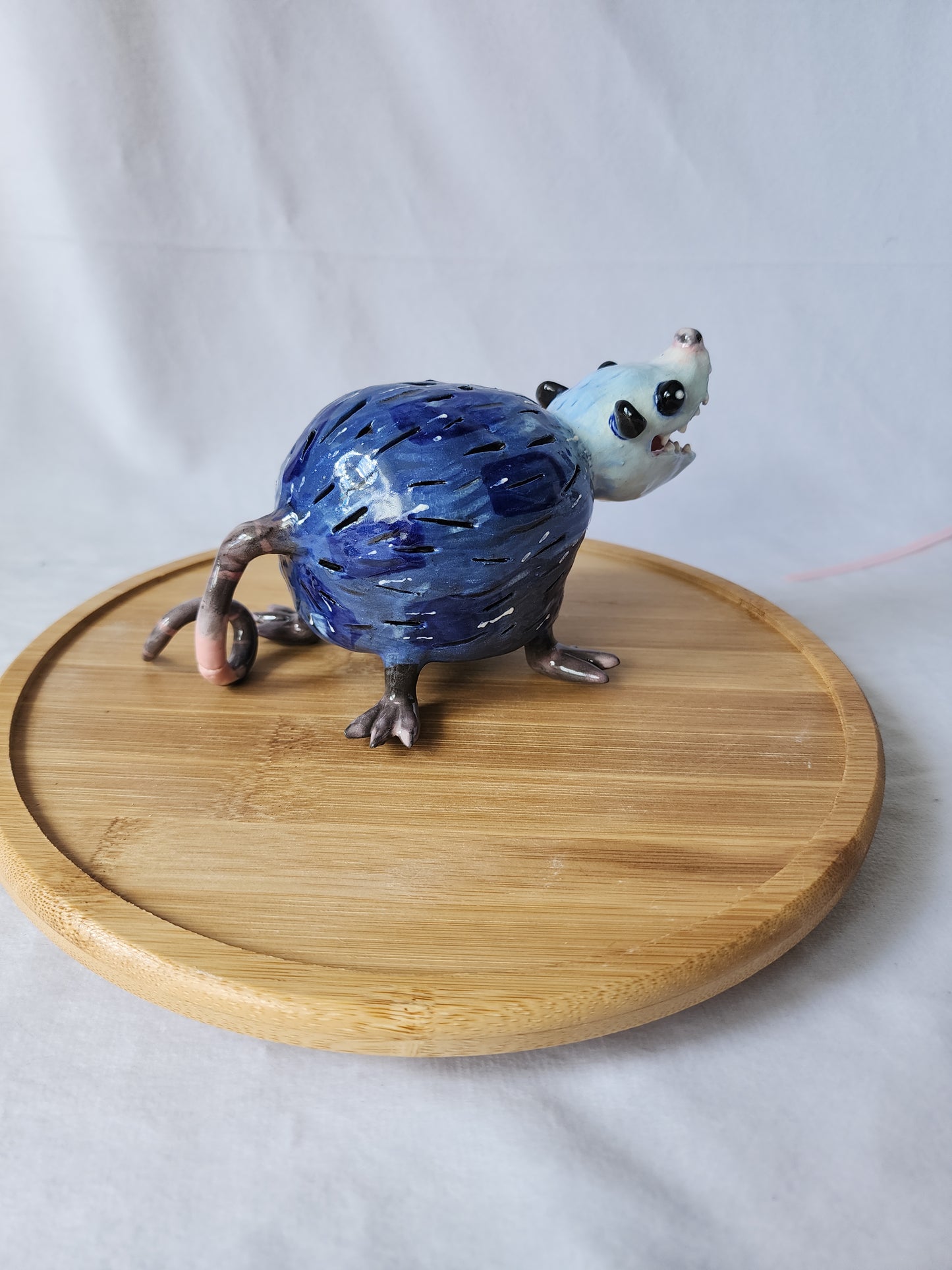 Ceramic opossum lamp
