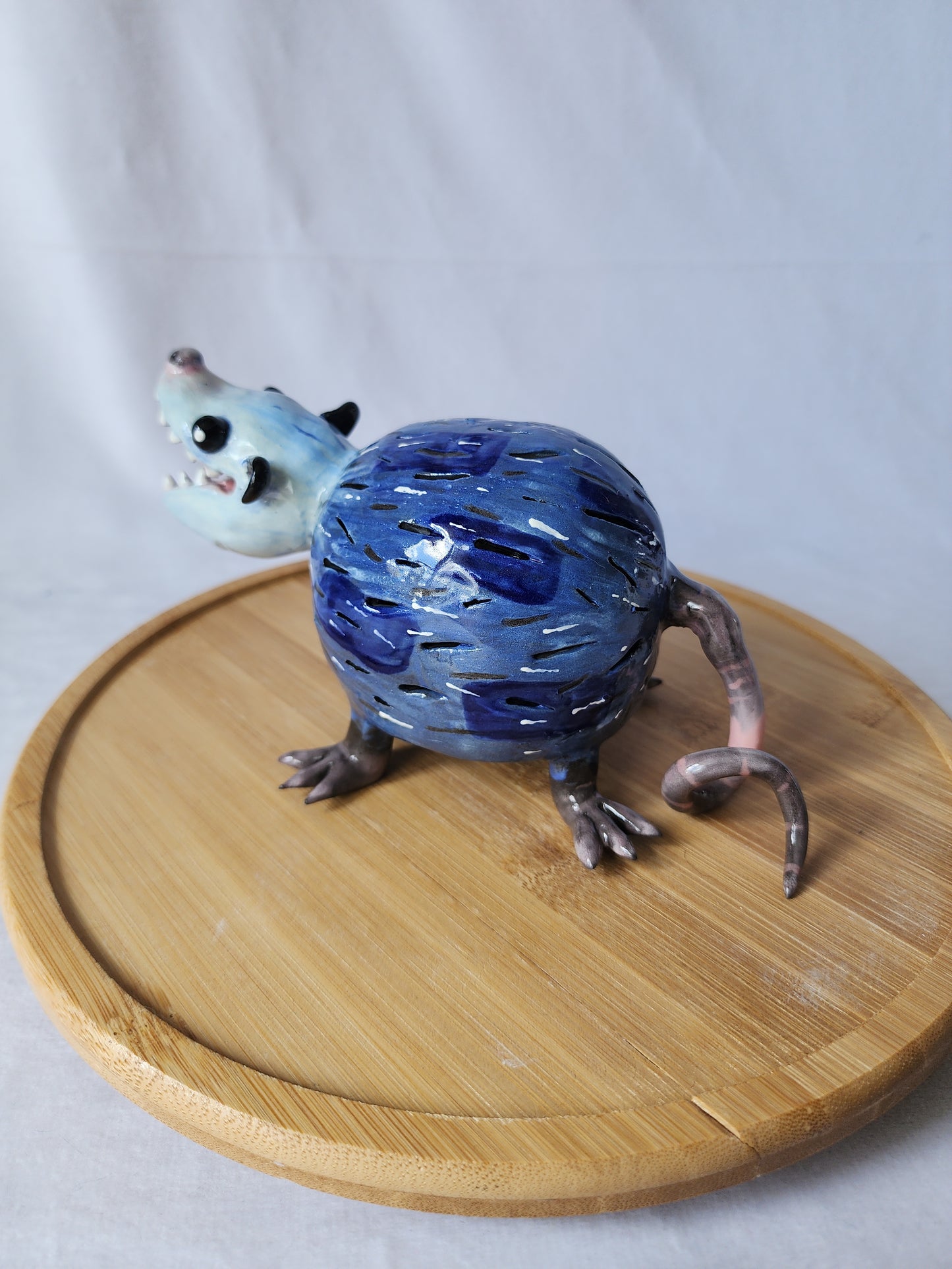 Ceramic opossum lamp