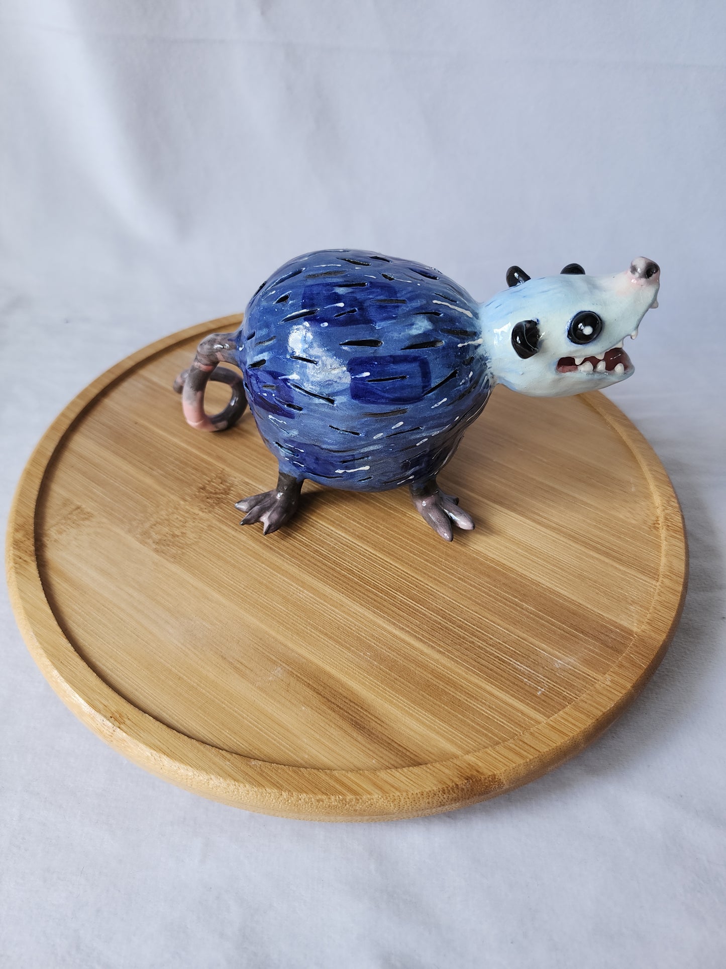 Ceramic opossum lamp