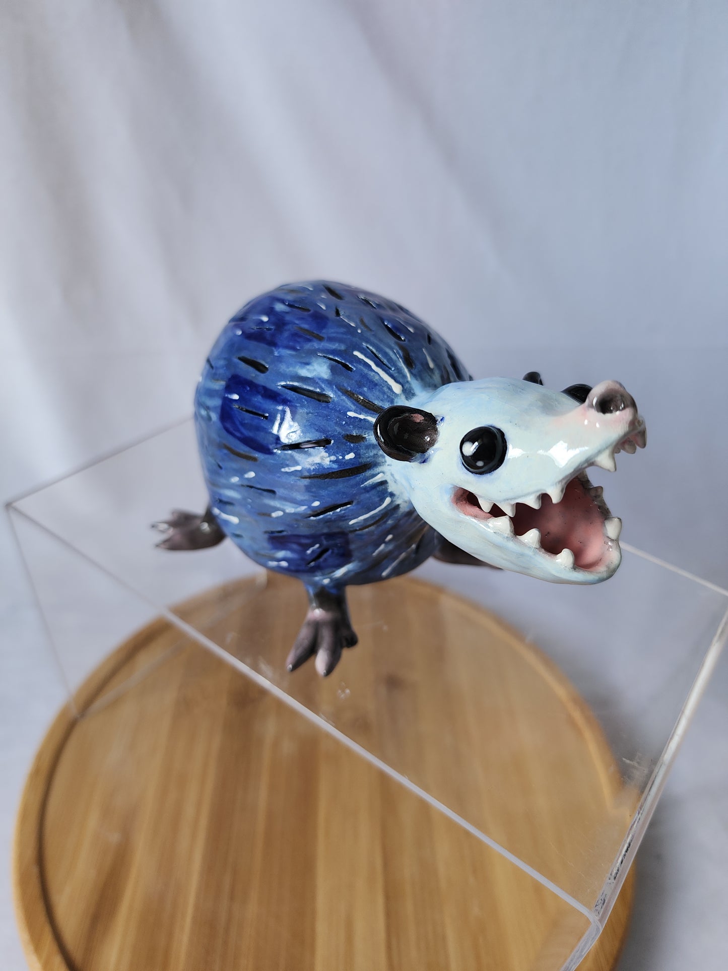 Ceramic opossum lamp