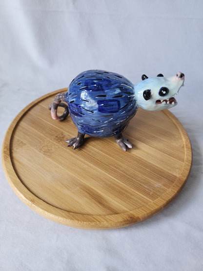 Ceramic opossum lamp