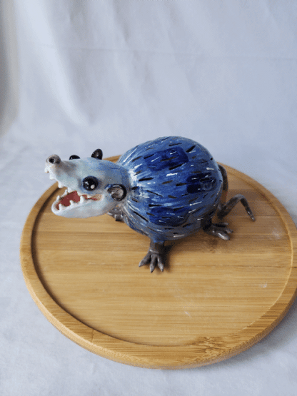Ceramic opossum lamp