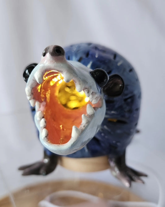 Ceramic opossum lamp